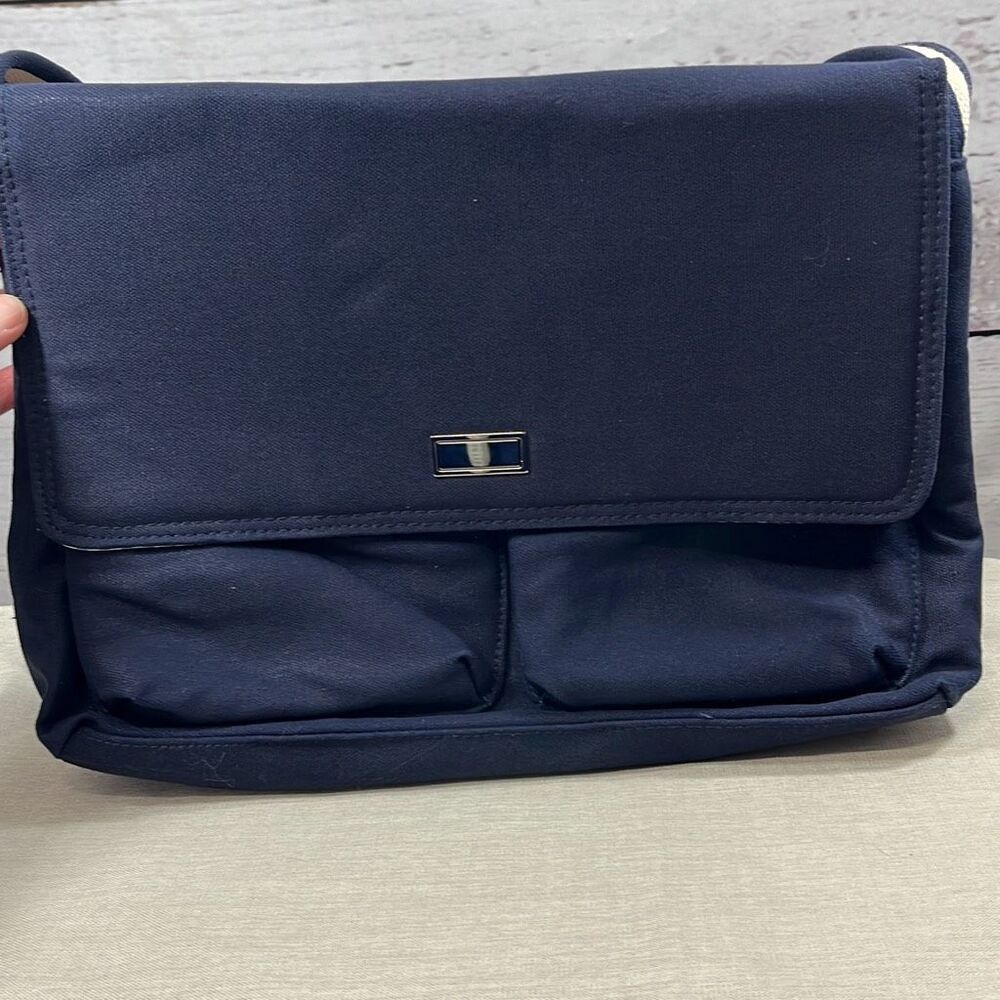 Jaclyn Smith navy blue satchel purse with checkered white and blue pattern insid